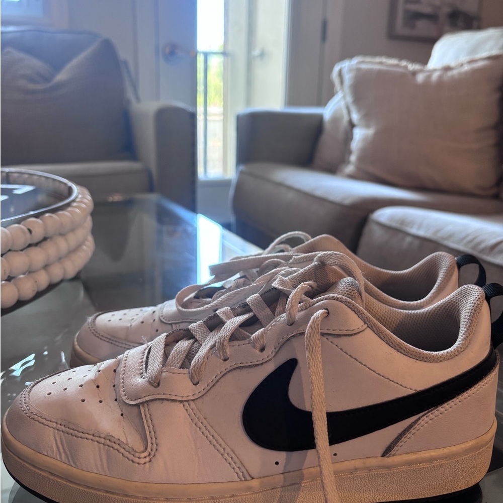Nike White Sneakers with Black Swoosh